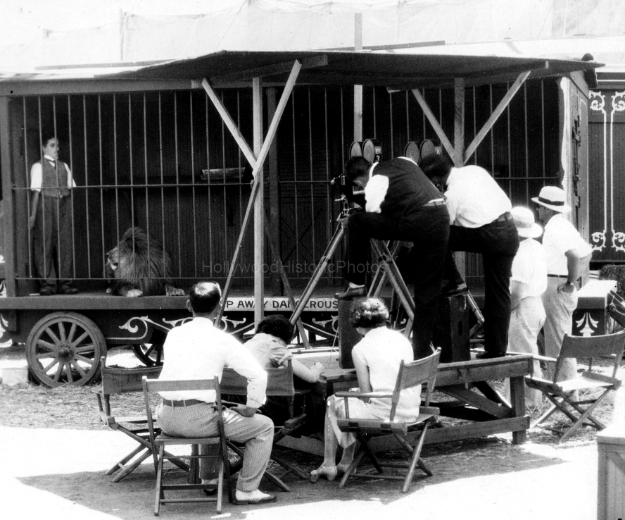 The Circus 1926 1 Charlie Chaplin in cage with the lion wm.jpg